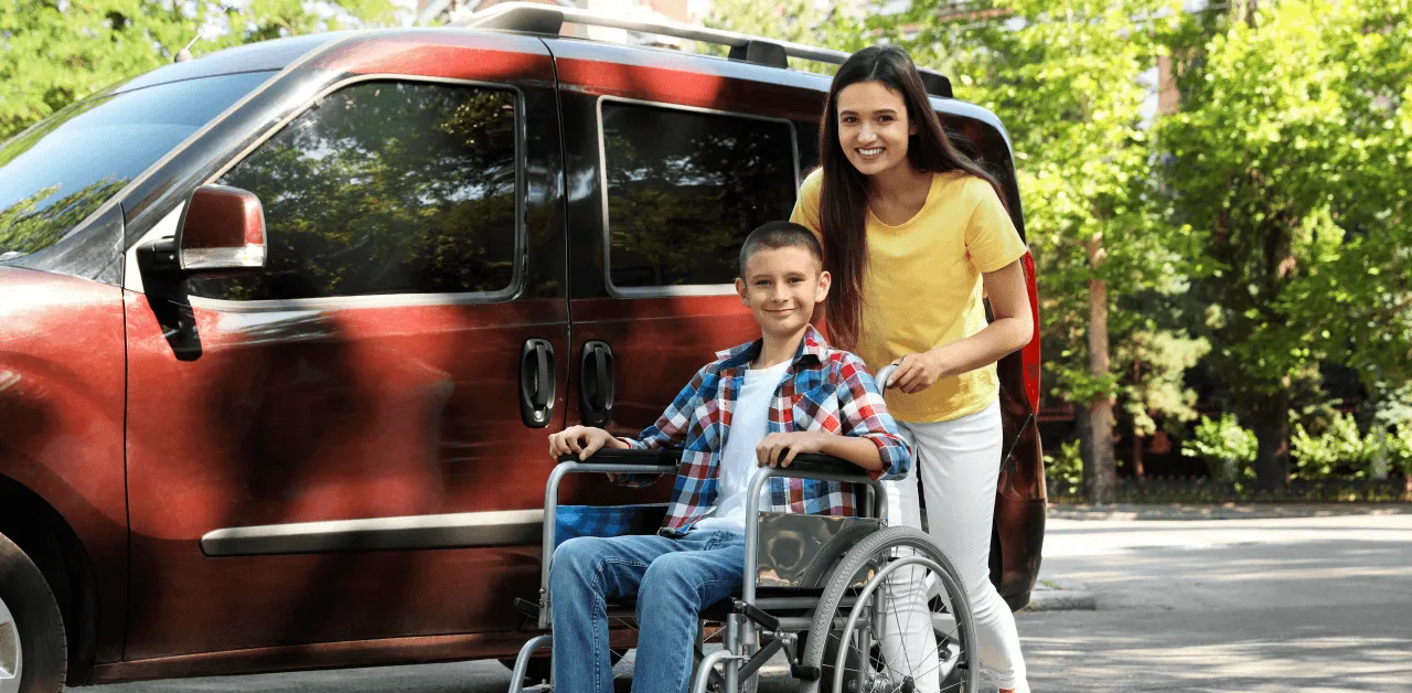 student in wheel chair getting specialized transportation to go to school
