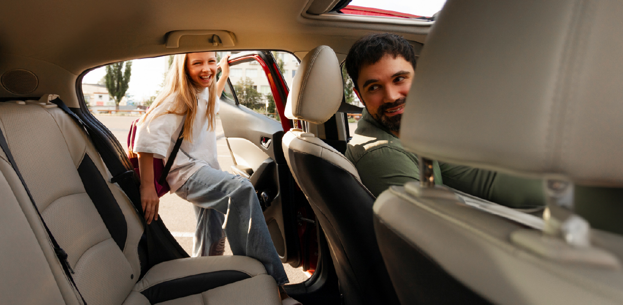 Student getting into an EverDriven vehicle with a driver, showing safe and reliable school transportation