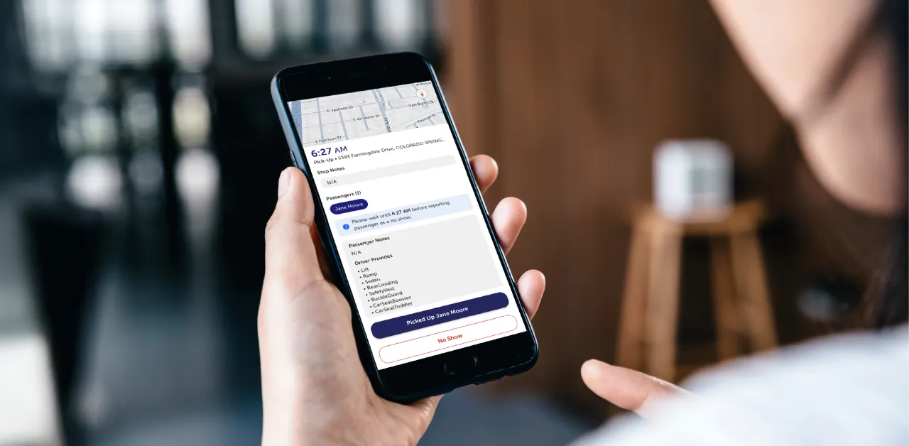 Parent using a transportation tracking app with GPS updates for student pick-up and drop-off.