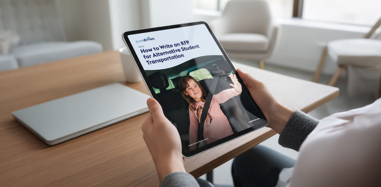 tablet displaying a guide about writing an RFP for alternative student transportation