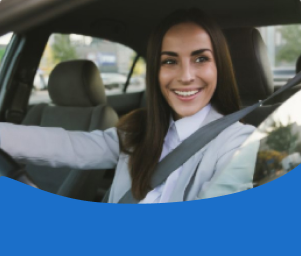 A smiling woman in a car, wearing a seatbelt, represents driver safety. Text reads "Driver Safety Standards Are Non-Negotiable."